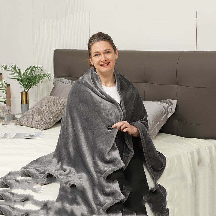 Woman wearing brown heated fleece shawl