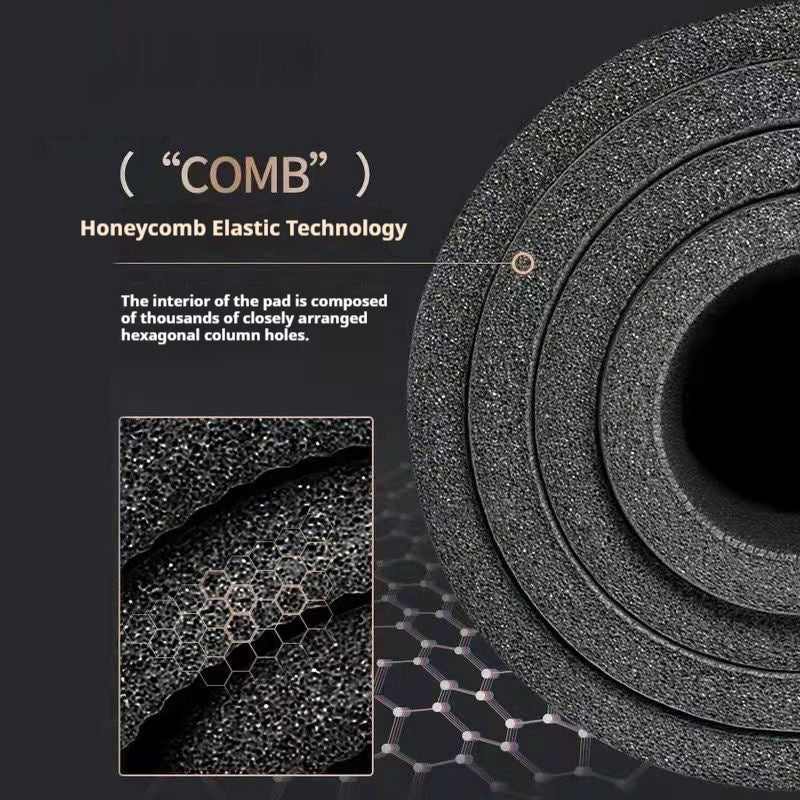 Thick grey exercise mat rolled with carry strap