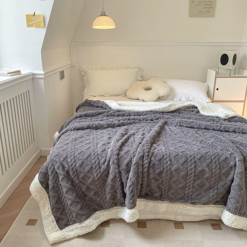 Cream cable knit blanket with sherpa border