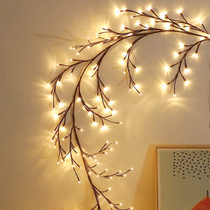 Warm white LED branch light on wall