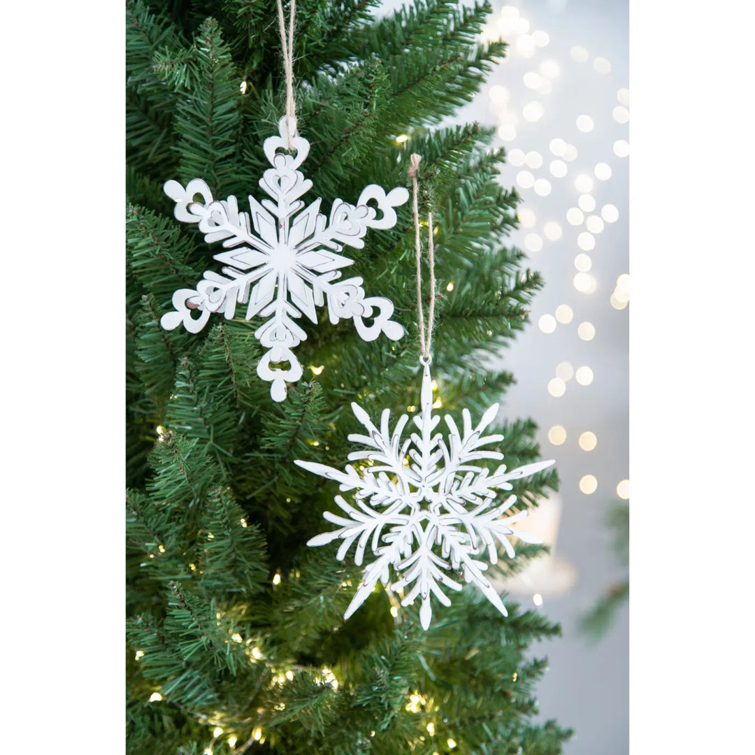 White metal snowflake hanging decorations with rope