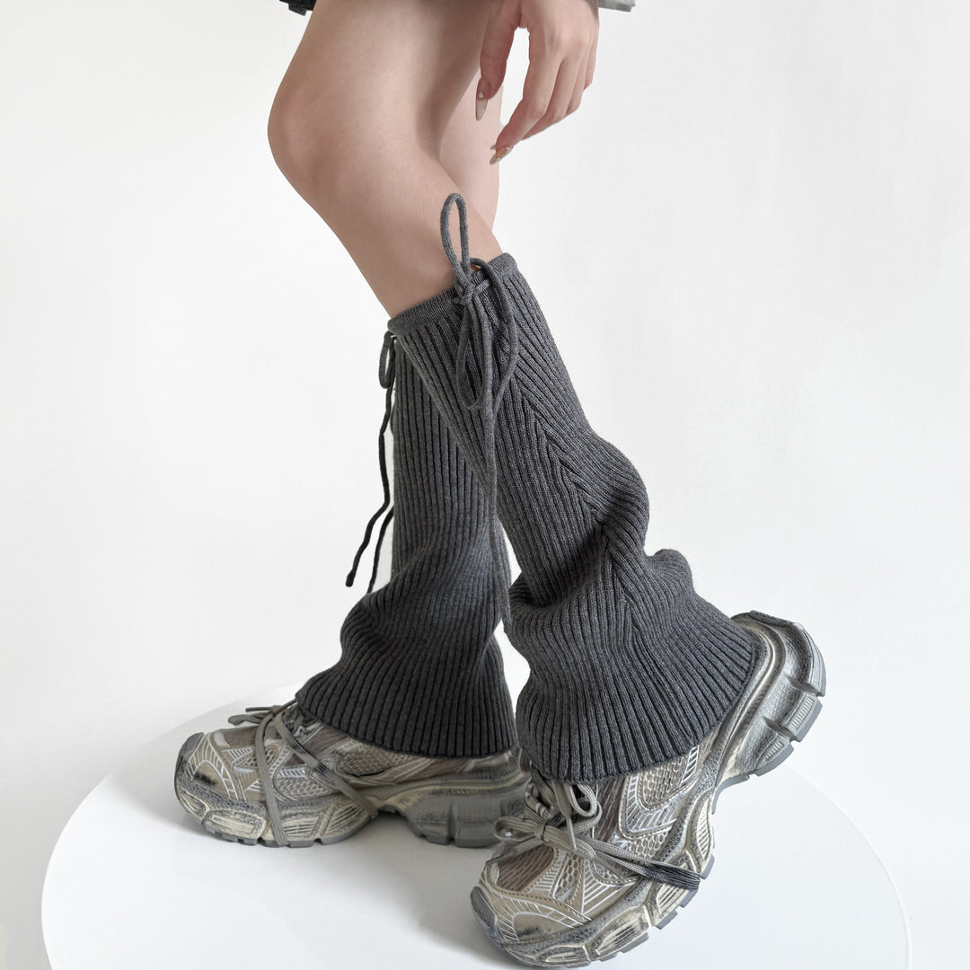 Pink flared ribbed leg warmers with tie