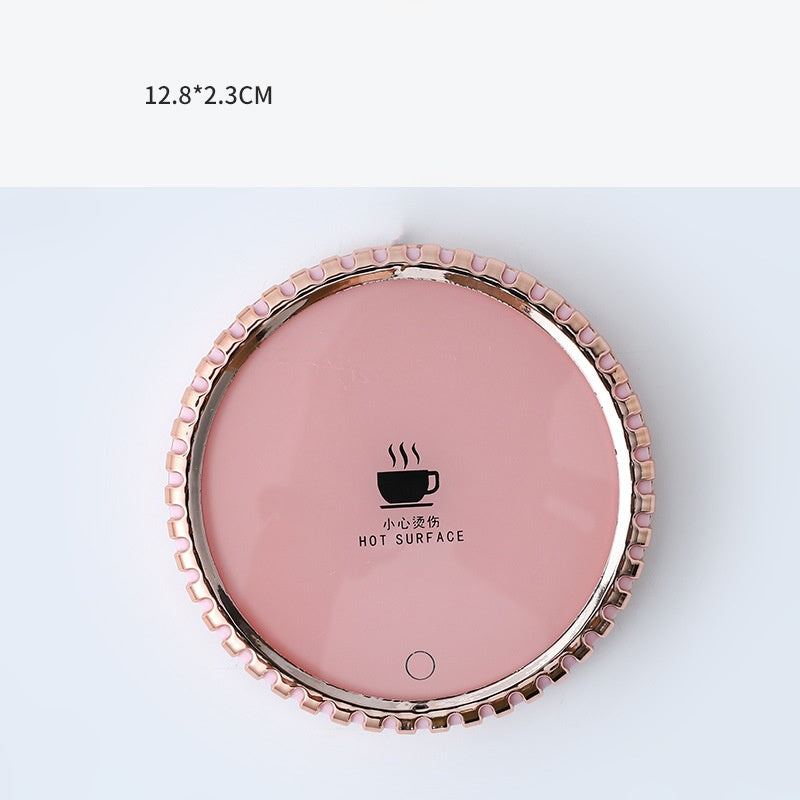Round mug warmer coaster with mug on top