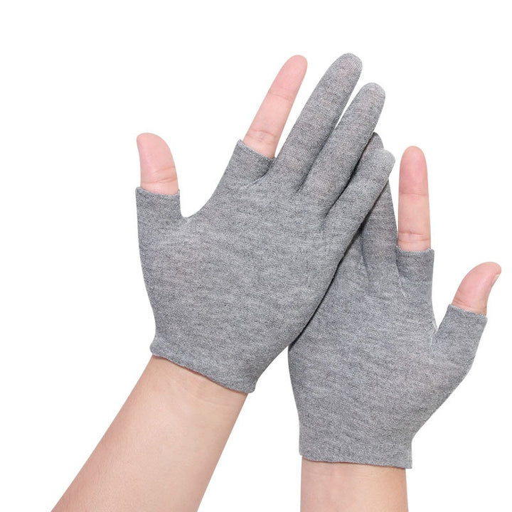 Grey cotton half-finger gloves on hands