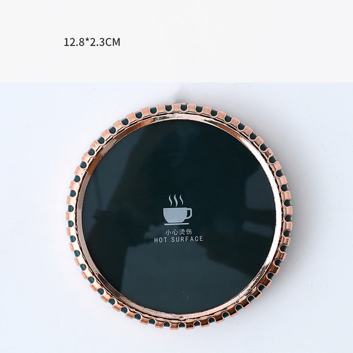 Round mug warmer coaster with mug on top