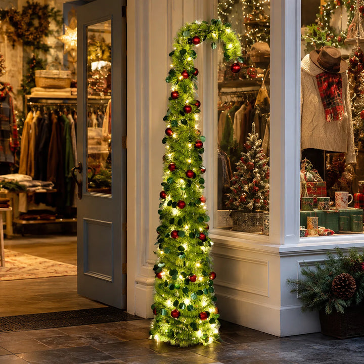 Green pop-up Christmas tree with red baubles