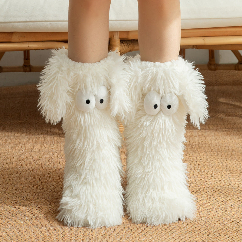 Fluffy snow socks with cartoon eyes
