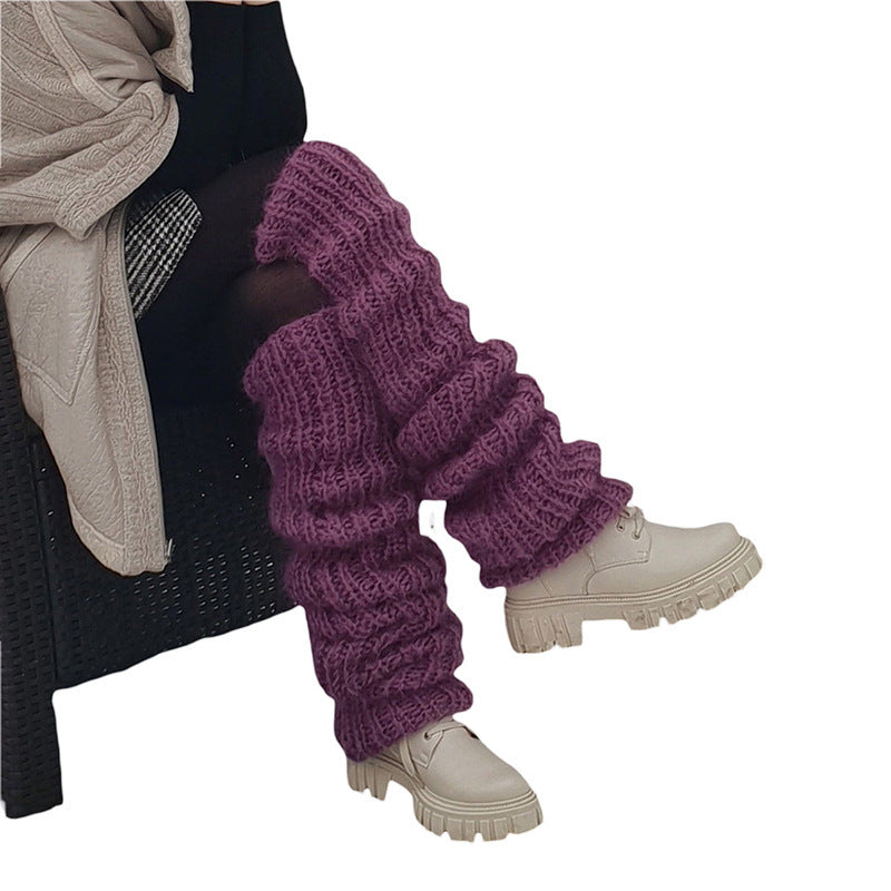 Chunky slouchy knitted leg warmers over boots