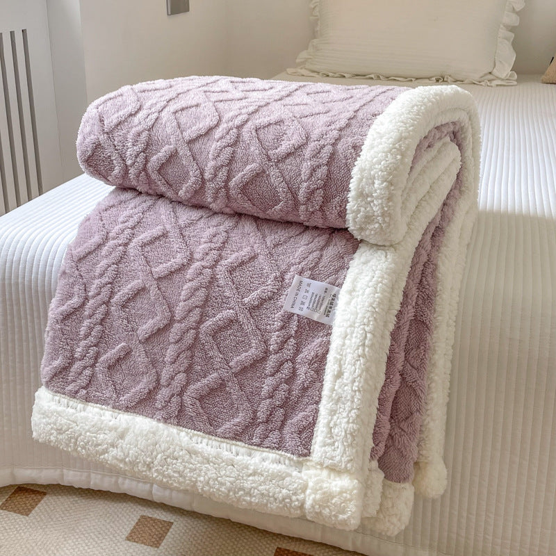 Cream cable knit blanket with sherpa border