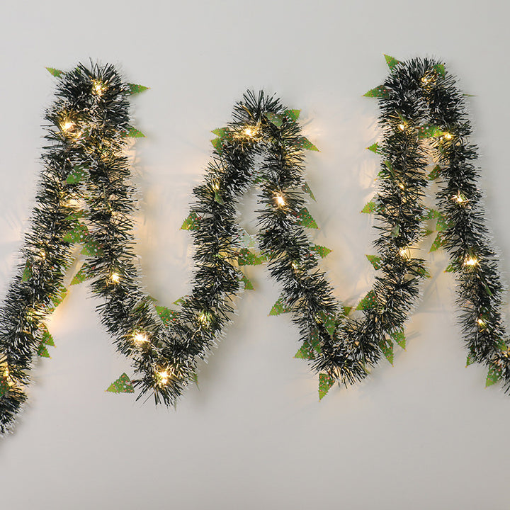 Tinsel Christmas garland with lights and Santas
