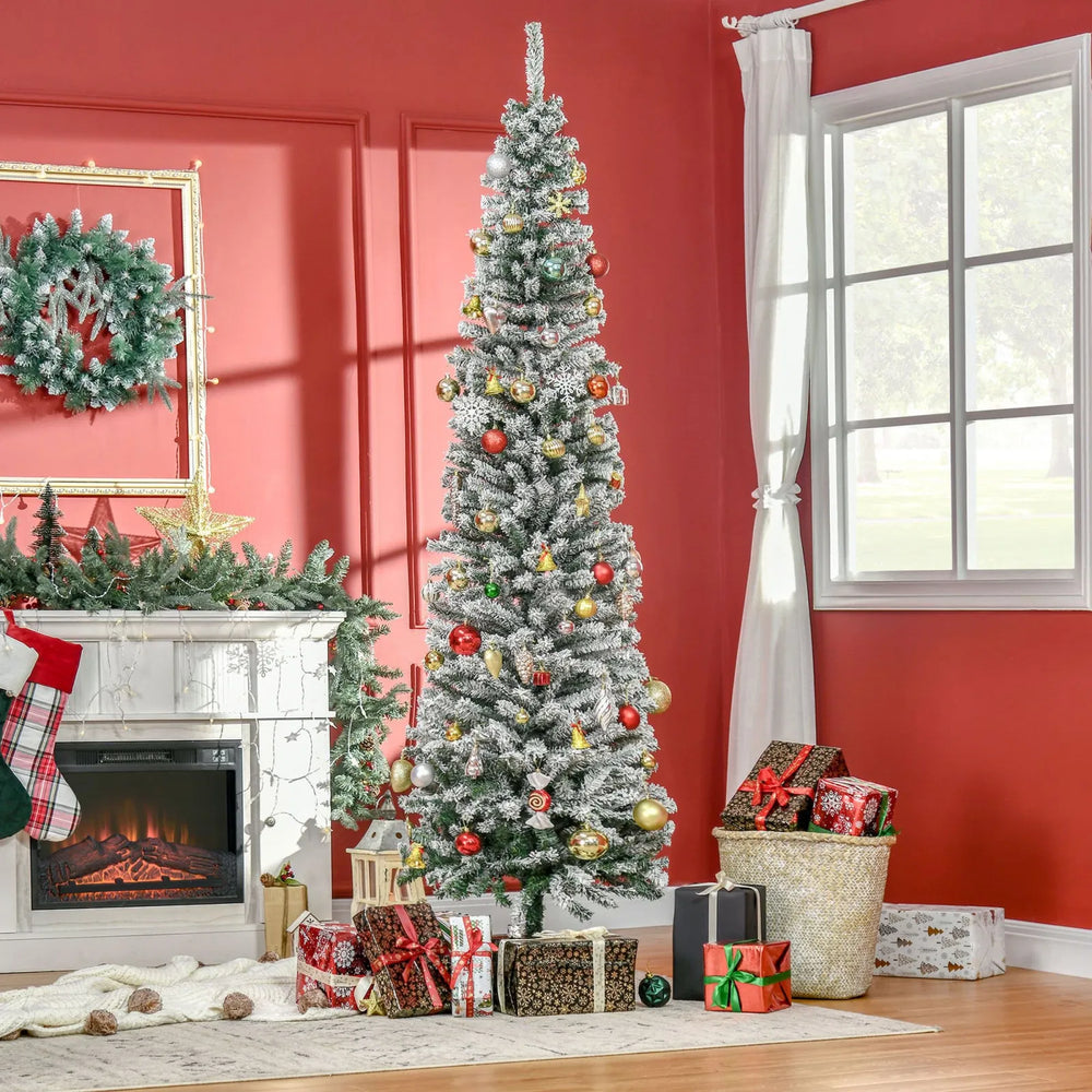 Tall slim snow-flocked tree, unlit