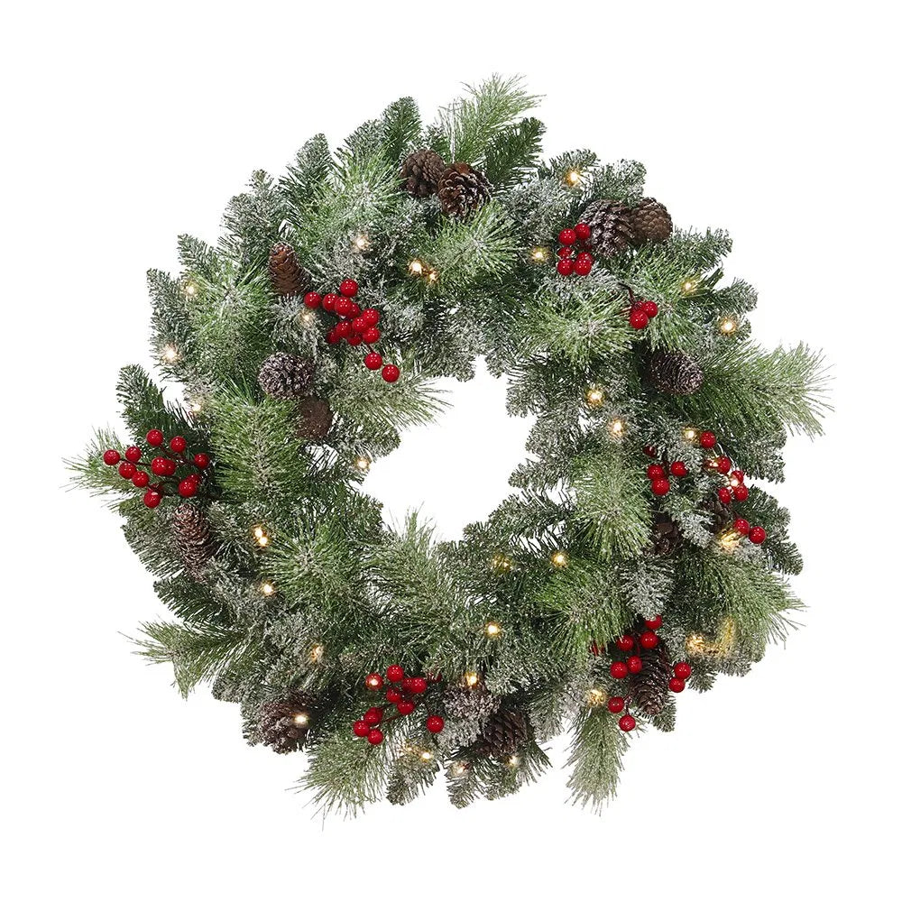 Lit wreath with pine cones and red berries