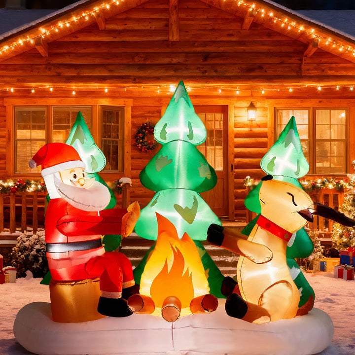 Inflatable Santa and reindeer around campfire